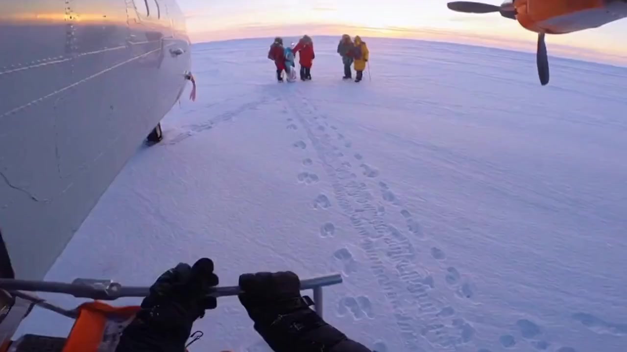 Walking in Antarctica with Group of explorers